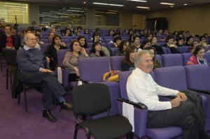 Dr. Antounian, left, and Dr. Koumjian, lower right, along with other health professionals in the audience, listening to Dr. Ramos-Gomez